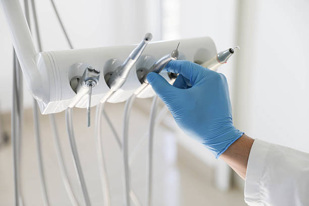 Professional Tooth Extraction technician working in Westchester, FL